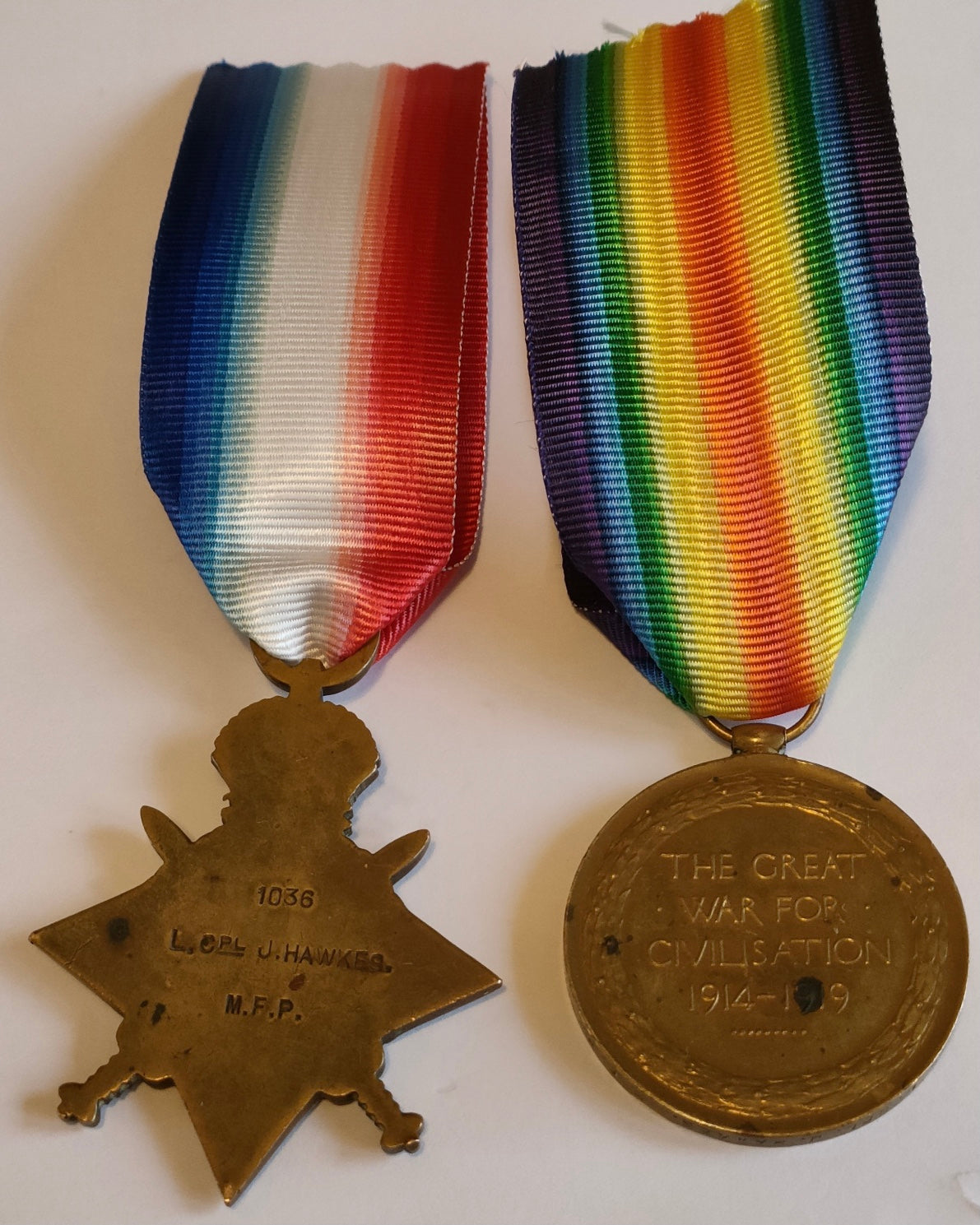 WW1-Medal pair/Mons Star Military Foot Police lance corporal Joseph Hawkes 1036